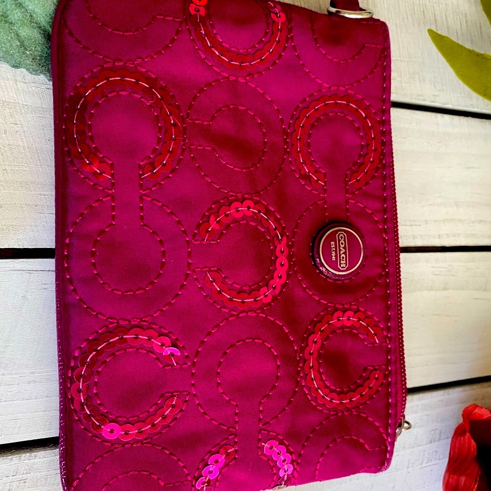 Coach mini change purse.